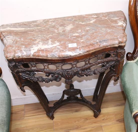 A Louis XVI style carved mahogany marble topped serpentine fronted console table W.79cm